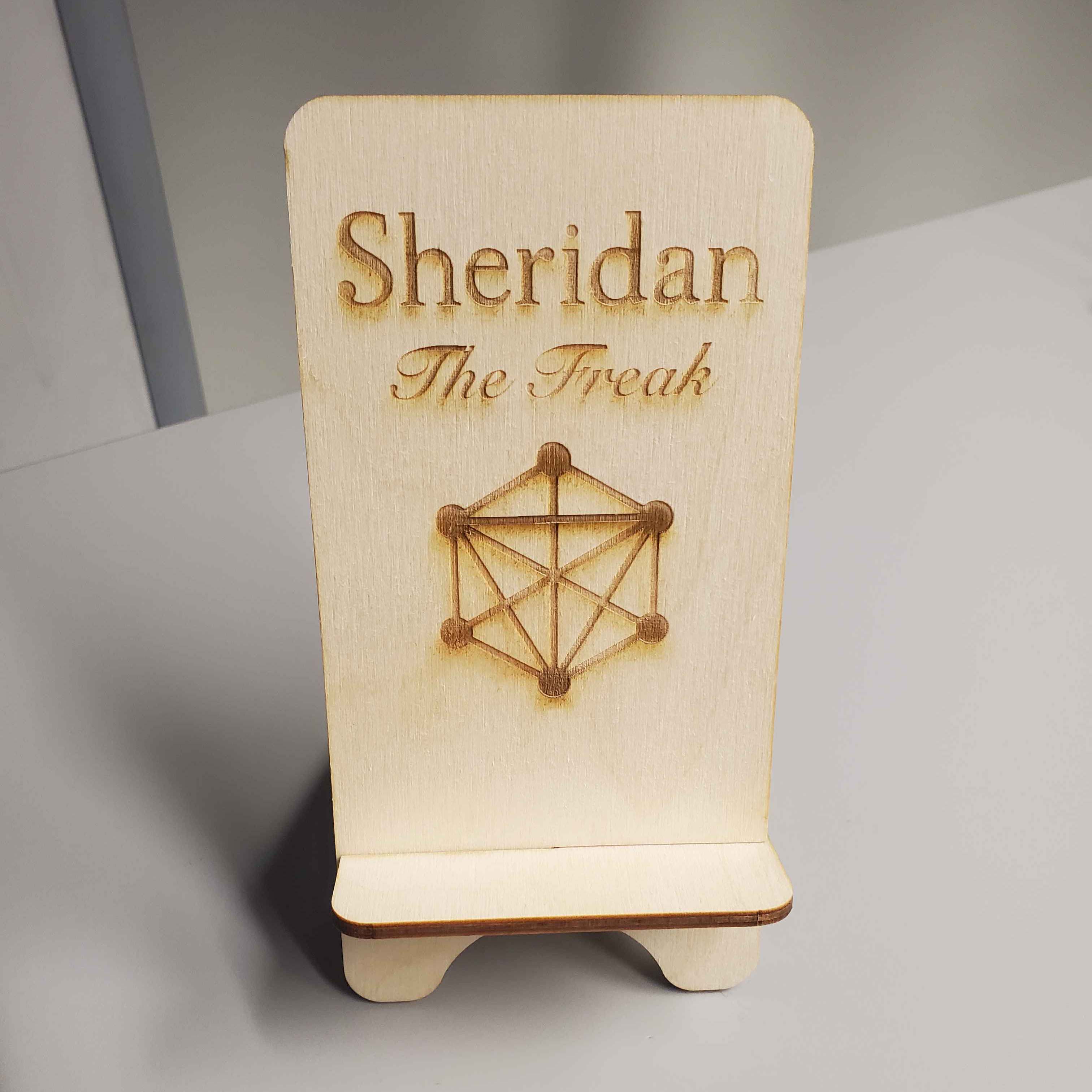 This is the front of the phone holder when it is assembled and sanded down