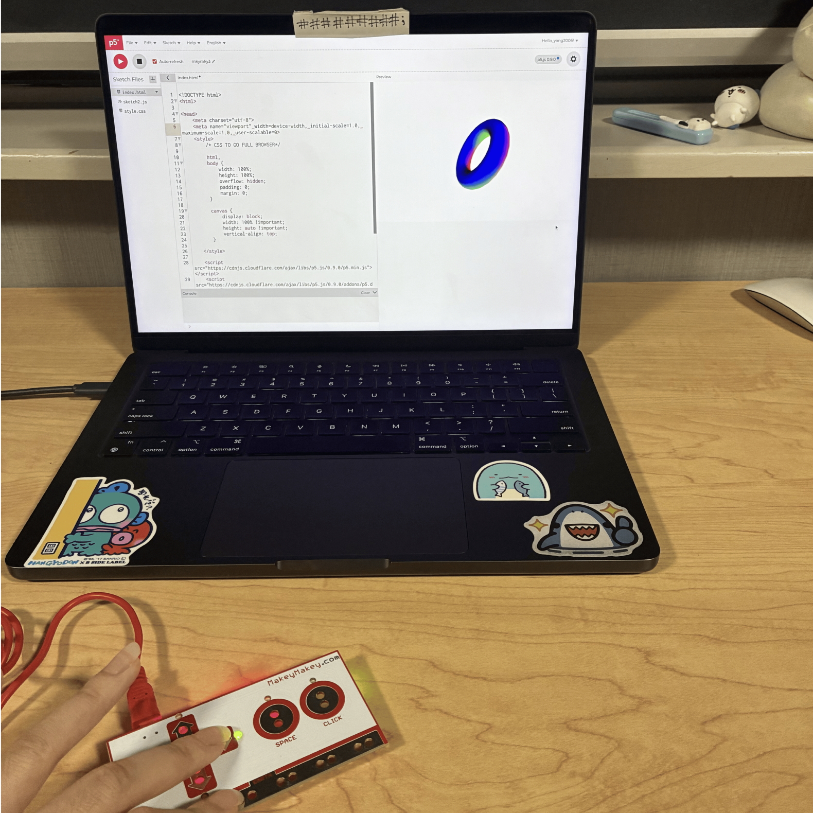This was the fourth sketch where the user can change the direction and perspective of the camera that is viewing the 3D torus and the plane underneath it by clicking the arrow buttons on the Makey Makey. I changed the camera perspective by clicking the arrow buttons.